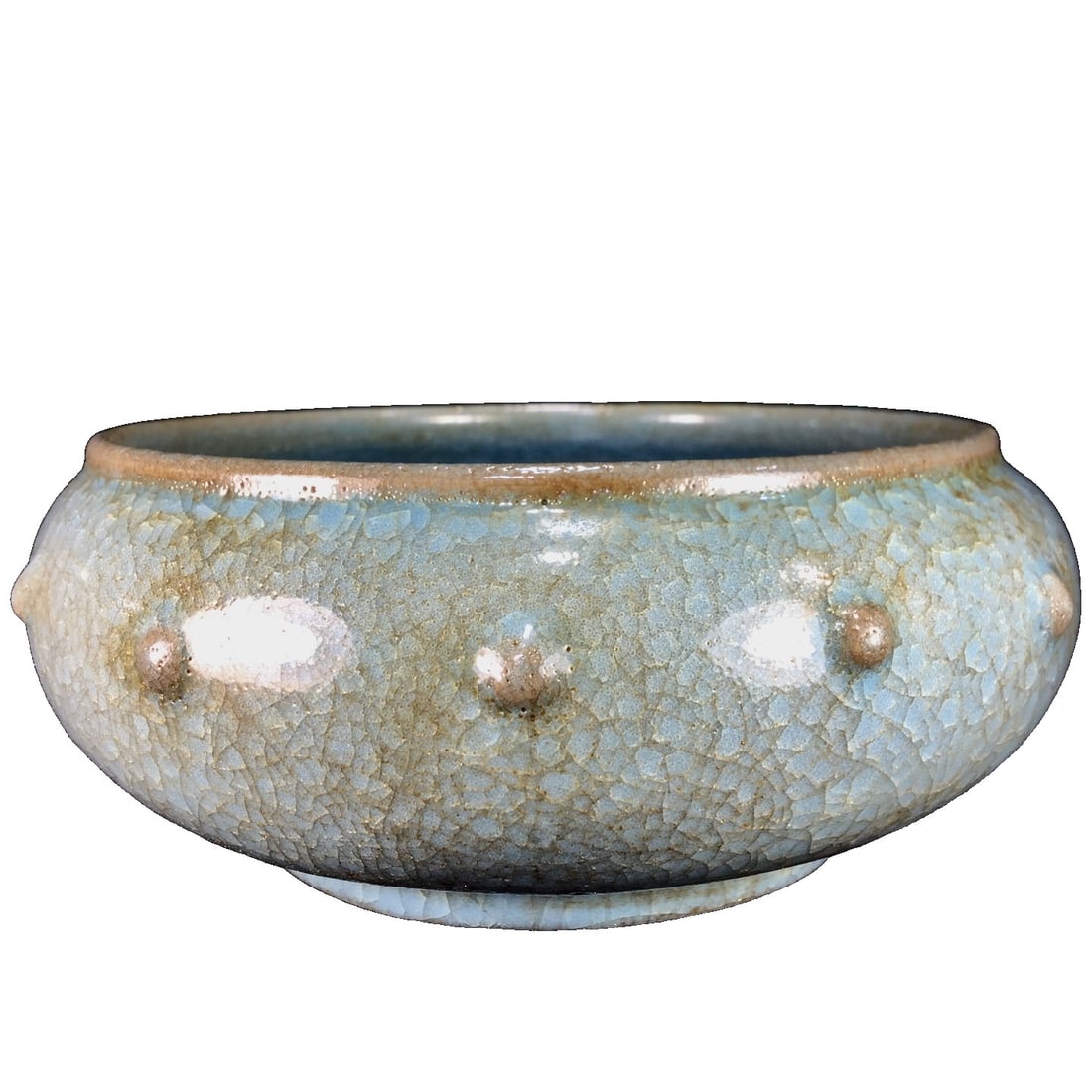 Song Dynasty Ice Plate Official Kiln Drum Nail Wash: This Song Dynasty ice plate official kiln drum nail wash features a unique shape and exquisite craftsmanship, showcasing the elegant style of the official kiln from the Song Dynasty, with a patina of 