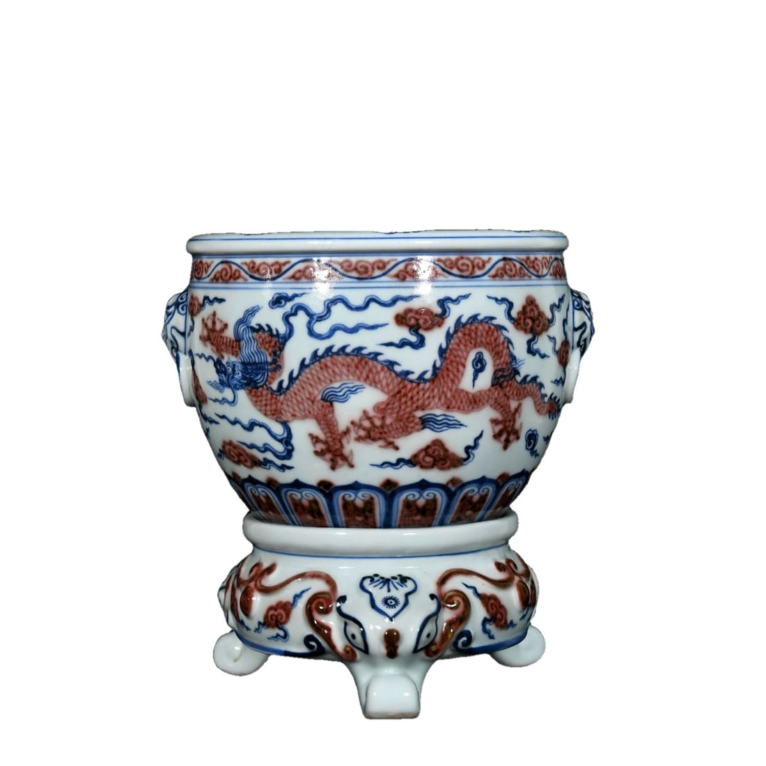 Ming Dynasty Blue and White Glazed Red Dragon Jar: This blue and white glazed red dragon jar is a rare piece from the Ming Xuande period, featuring exquisite dragon motifs that reflect elegant craftsmanship and profound cultural heritage. The glaze is