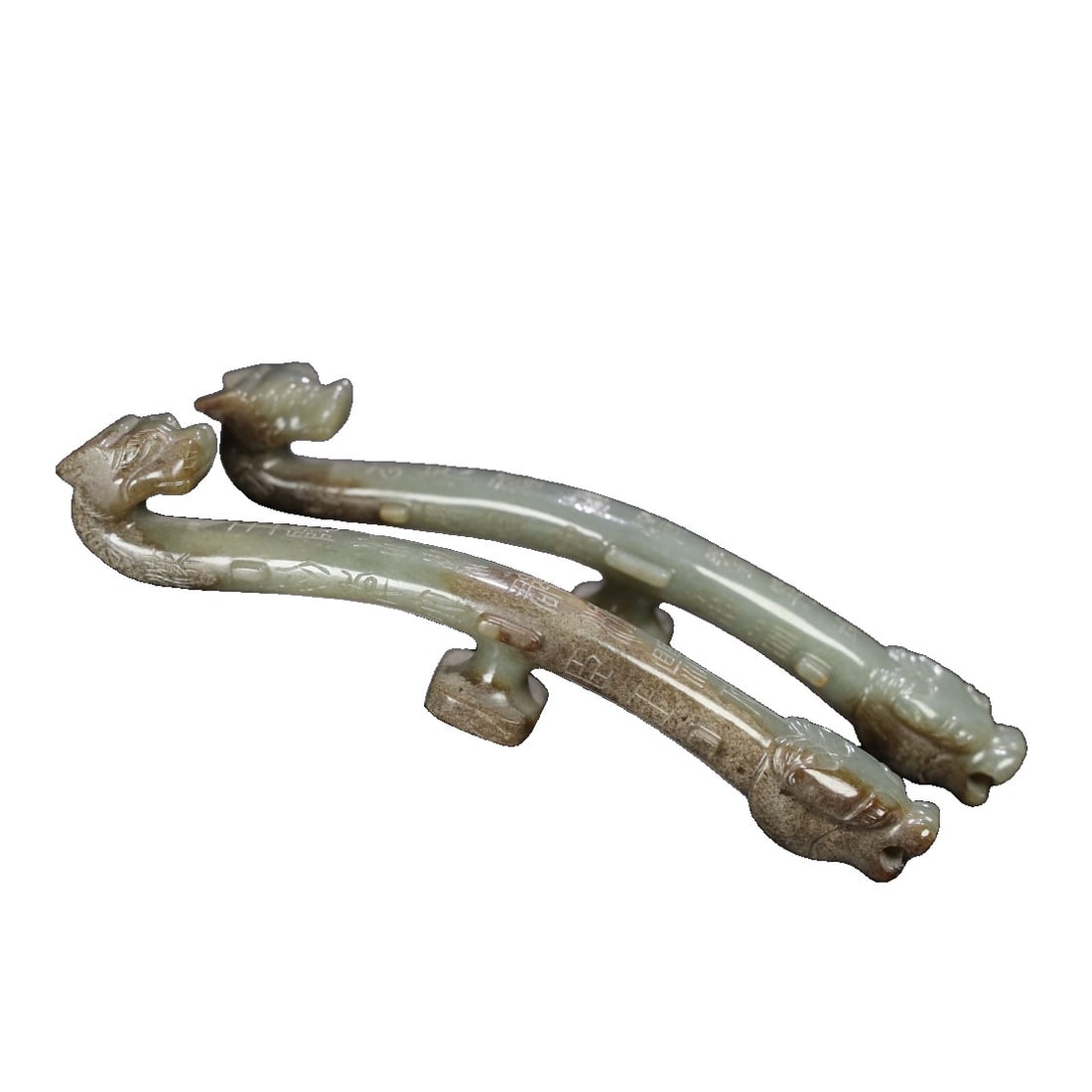 He Tian Jade Inscribed Hook: This He Tian jade inscribed hook features a delicate and oily texture, with an aged patina that enhances its charm. The exquisite details reflect a unique artistic appeal. (Length 17cm, Width 2cm, Hei