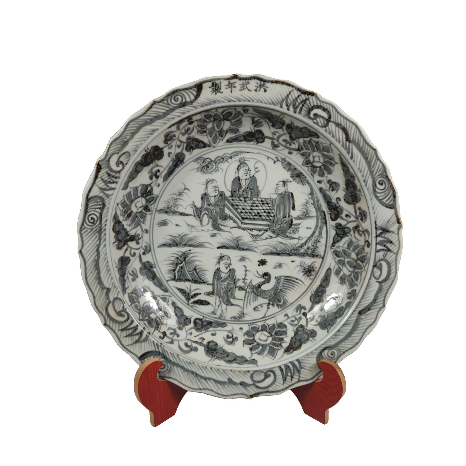 Ming Dynasty Blue and White Figure Plate: This plate features blue and white figure decoration from the Ming Hongwu period, showcasing exquisite craftsmanship and vivid character representations that reflect the artistic style and cultural es