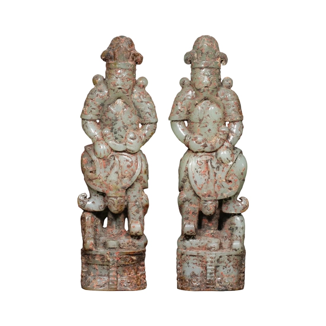 Han Dynasty Hetian Jade Warrior Figurines: This pair of Han Dynasty Hetian jade warrior figurines showcases exquisite craftsmanship and fine jade quality, with a patina that speaks to its age. The figures are vividly depicted with meticulous a