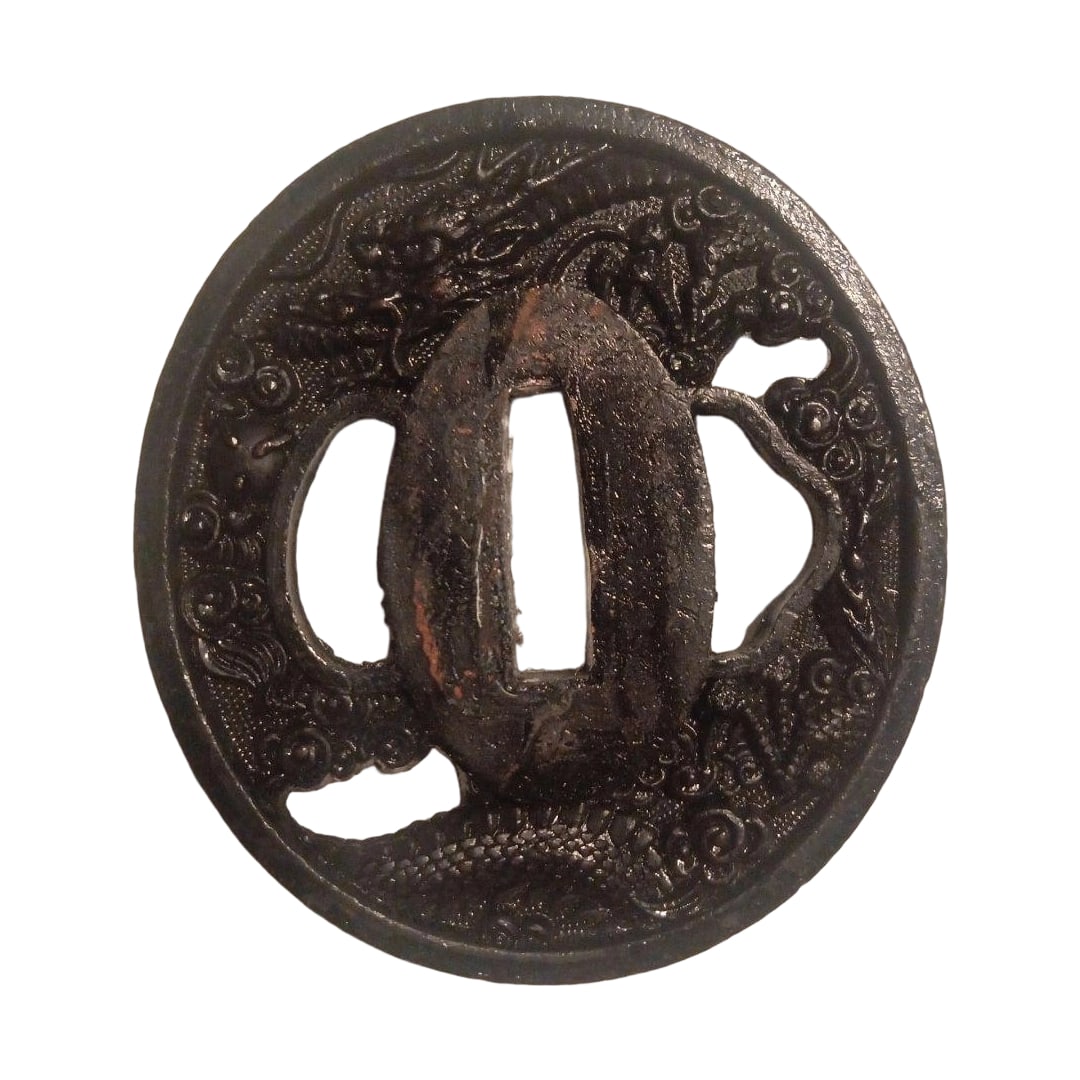 Dragon Motif Tsuba, Alloy Construction: Tsuba with Dragon Motif, Alloy This is a tsuba crafted from alloy, featuring intricately pierced carvings of dragon and cloud motifs. The material is alloy, and the design is a dragon motif. This item