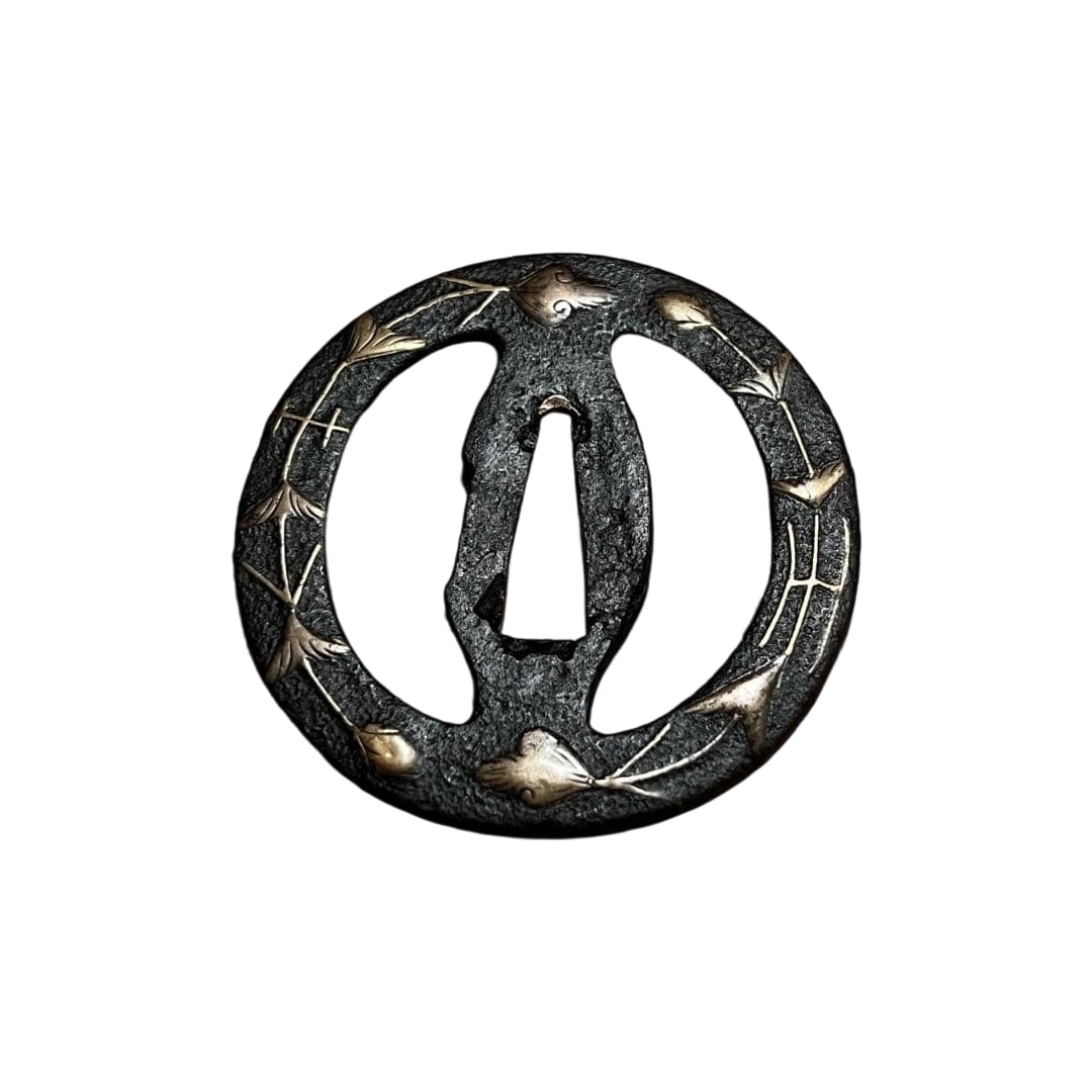 Sword Fittings, Iron Tsuba, Armor, Sword: Sword Fittings: Iron Tsuba, Arms and Armor, Sword This is a very ancient iron tsuba. On the beautifully uniform sea cucumber-shaped tsuba, brass inlays depict vines and flowers. The inlays are preserv