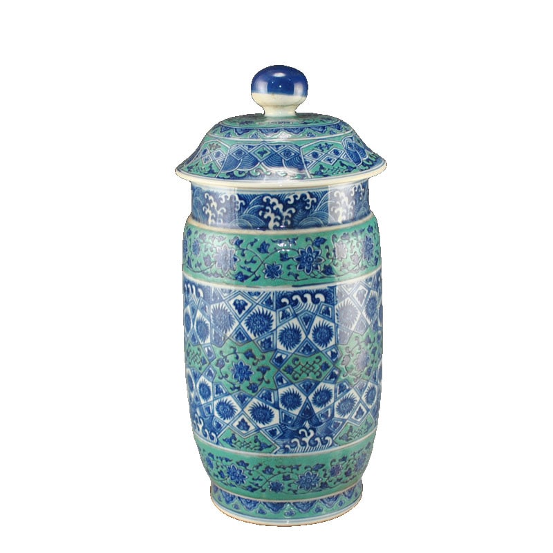Qing Dynasty Green Ground Blue and White Geometric Pattern Covered Jar: This Qing Dynasty green ground blue and white geometric pattern covered jar features a warm glaze and exquisite decoration, showcasing the craftsmanship and artistic style of the Qianlong period. The 