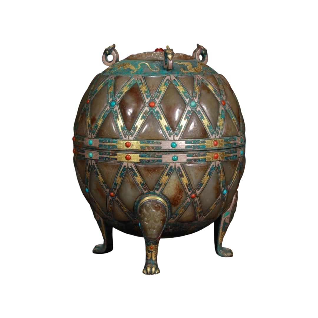 Bronze Tripod Censer with Gold and Silver Inlay and Jade: This bronze tripod censer features a bronze body with exquisite gold and silver inlay forming a diamond-shaped frame, interspersed with sugar-colored Hetian jade pieces. The nodes are adorned with tur