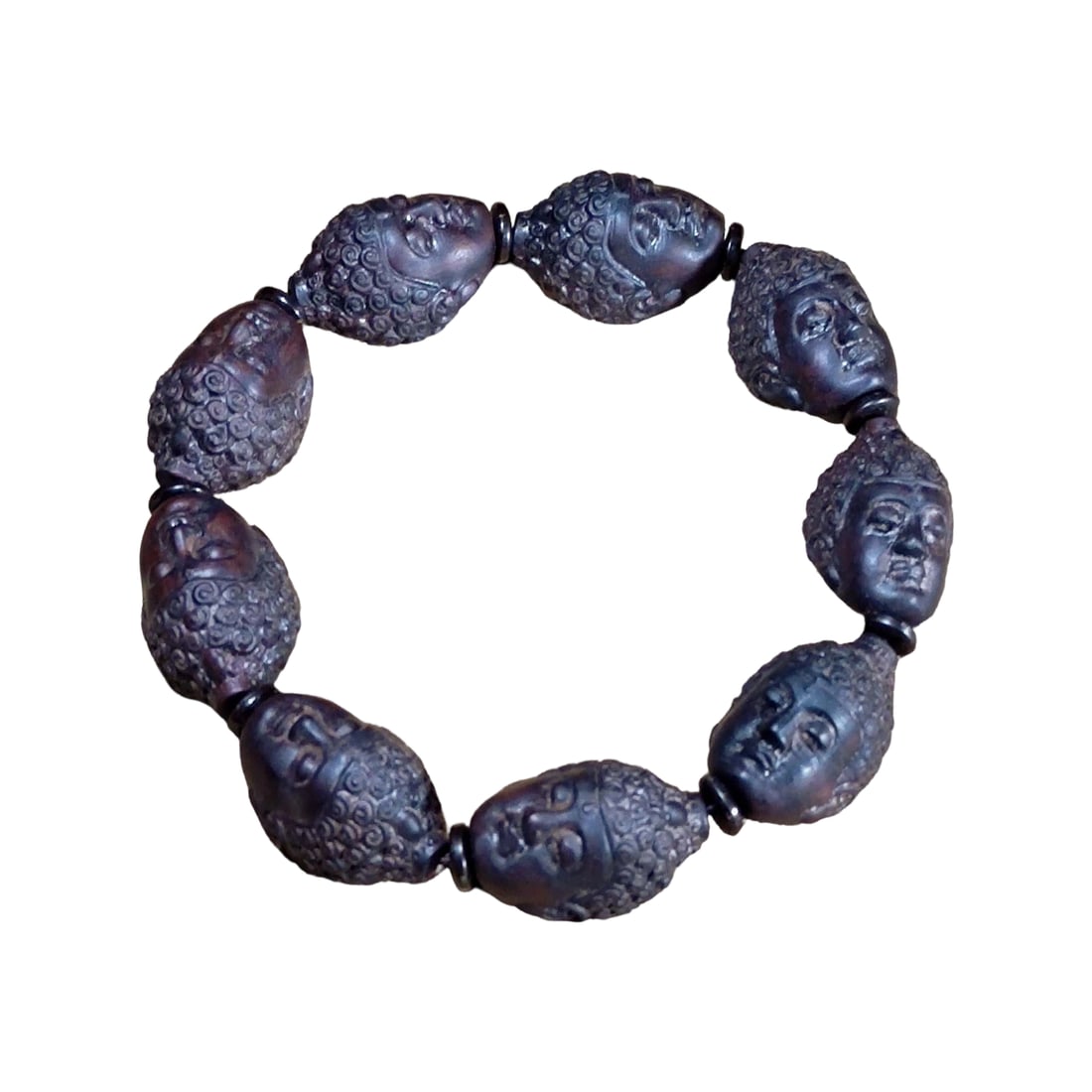 Vietnamese Old Material Black Chess Nan Agarwood Bracelet: This bracelet is made from Vietnamese old material black chess nan agarwood, featuring a delicate texture and beautiful grain, exuding a unique fragrance with high collectible value. The design of the