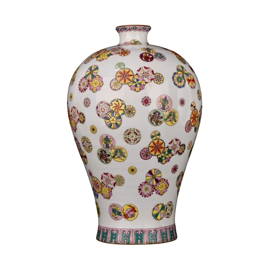 Qing Dynasty Famille Rose Ball Flower Meiping: This Qing Dynasty famille rose ball flower meiping features an elegant shape and vibrant colors, showcasing the exquisite craftsmanship and unique style of the Qianlong period. The beautifully decorat