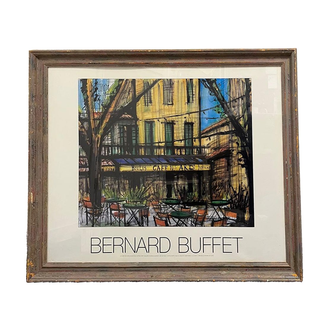 Bernard Buffet Painting Retro Poster Framed: Bernard Buffet Painting Vintage Poster Framed The artwork titled "Le Cafe des Arts" was created by the artist Bernard Buffet in 1979. The materials used for the piece include glass, poster-like painti