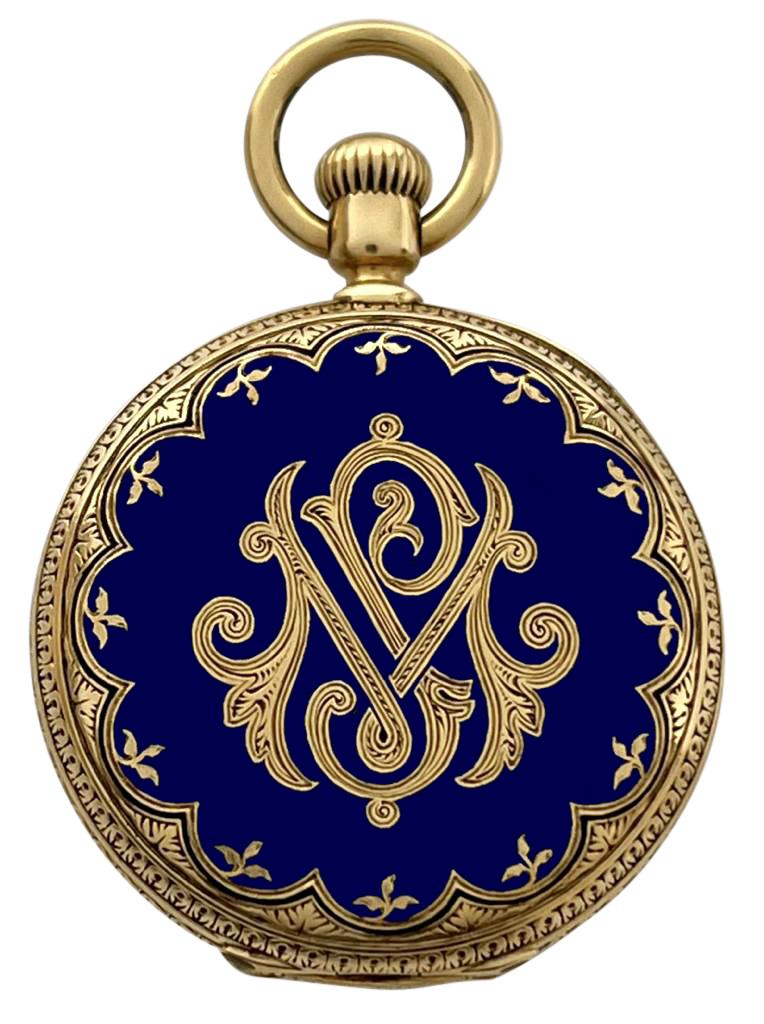 Patek Philippe 18K Yellow Gold Blue Enamel Pendant Watch with Very Rare Blue Enamel Dial: The fine and rare 18k yellow gold and blue enamel open face pendant watch by Patek Philippe has an extremely rare guilloche enamel blue dial with gilt Roman numerals and Arabic minute chapter ring. Th