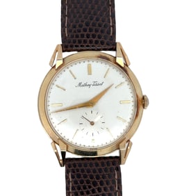 MATHEY TISSOT 14K MEN’S WRISTWATCH WITH UNUSUAL LUGS, CIRCA 1955