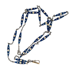 BLUE AND WHITE ENAMEL PLATINUM EDWARDIAN CHAIN, CIRCA 1910