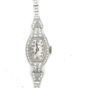 MOVADO RETRO STYLE PLATINUM AND DIAMOND COCKTAIL WATCH