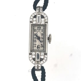 MARCUS AND CO. PLATINUM AND DIAMOND ART DECOCOCKTAIL WATCH