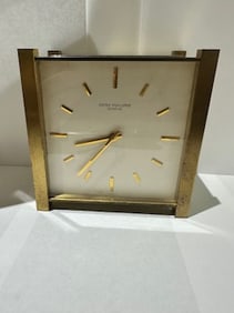 PATEK PHILIPPE GILT BRASS SOLAR DESK CLOCK, CIRCA 1970