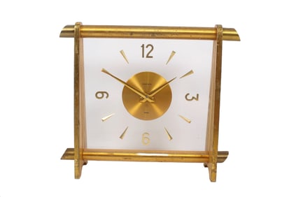 CARTIER GILT BRASS 8 DAY TABLE CLOCK, CIRCA 1950