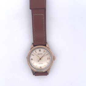 MOVADO STEEL AND GOLD MEN’S AUTOMATIC WRISTWATCH WITH DATE, CIRCA 1950