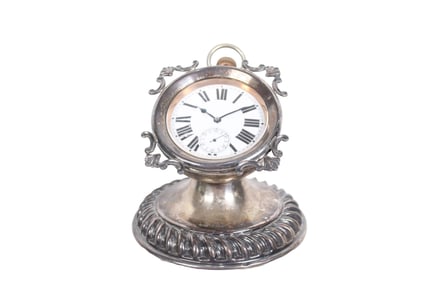 GOLIATH WATCH IN SILVER DESK STAND, CIRCA 1905