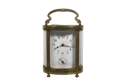 FRENCH OVAL GILT BRASS CARRIAGE CLOCK, CIRCA 1914
