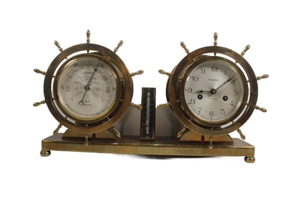 WATERBURY NO. 19 SHIPS WHEEL CLOCK AND BAROMETER BRONZE DESK STAND, CIRCA 1929