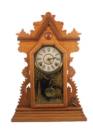 E. INGRAHAM GINGERBREAD OAK KITCHEN CLOCK, CIRCA 1890