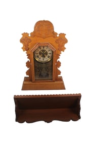 E. INGRAHAM TOPAZ MODEL OAK KITCHEN CLOCK, CIRCA 1896