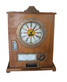 BRYANS TWELVEWIN CLOCK SLOT MACHINE, CIRCA 1920