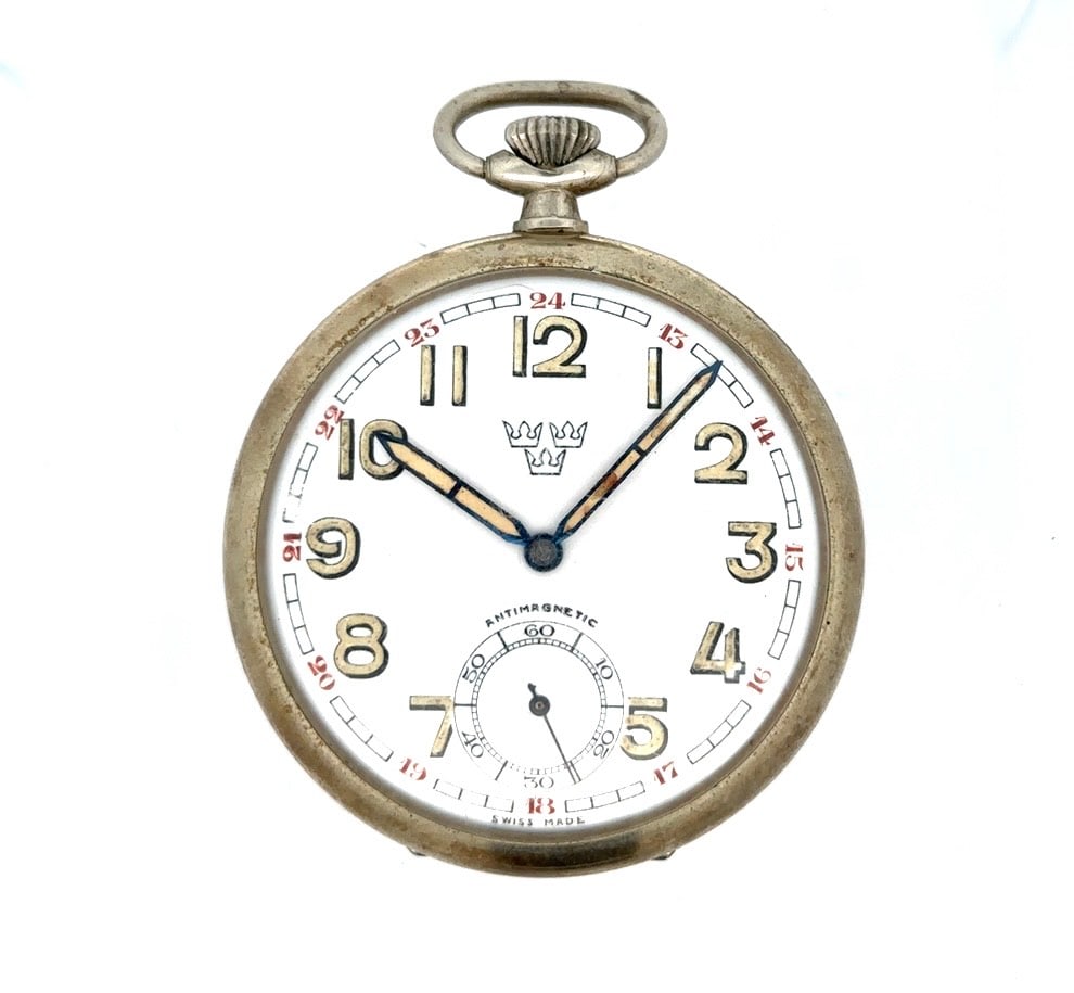 SWISS ANTIMAGNETIC OPEN FACE POCKET WATCH FOR SWEDISH NAVY: 15 Jewel Swiss Open Face Pocket Watch With Swedish Navy Markings. The watch has a 15 jewel pendant wind and set frosted gilt bridge plate movement marked 15 Jewels and Swiss Made. The watch has a sing