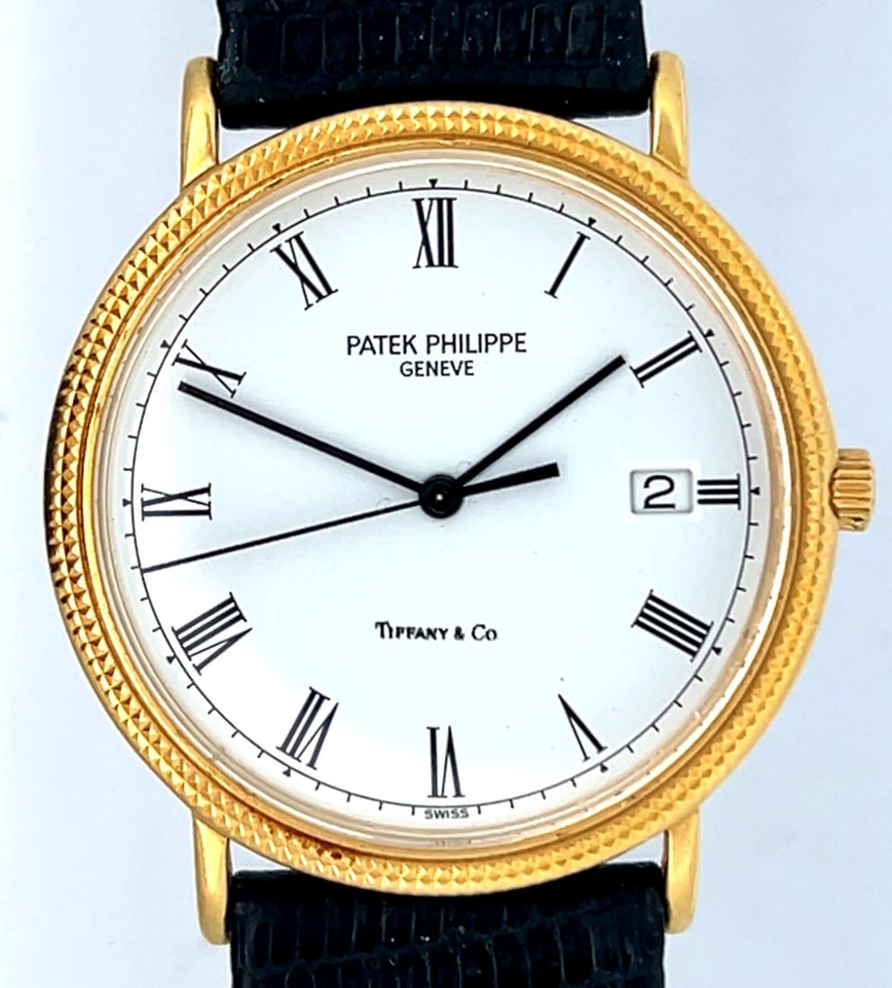PATEK PHILIPPE FOR TIFFANY AND CO. 18K GOLD HOBNAIL BEZEL CALATRAVA REF. 3944 WRISTWWATCH (1 of 8)