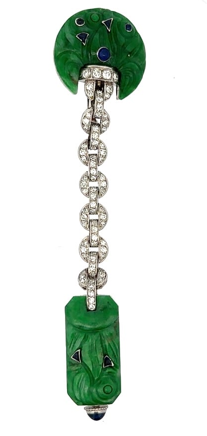 GUBELIN ART DECO JADE PLATINUM DIAMOND AND SAPPHIRE LAPEL WATCH AND PIN, CIRCA 1920: Exceptionally Fine And Rare High Style Carved Jade, Diamond and Sapphire Lapel Watch Has A Silvered Metal Dial Signed E. Gubelin, Lucerne. The watch case is French hallmarked platinum and the case bac