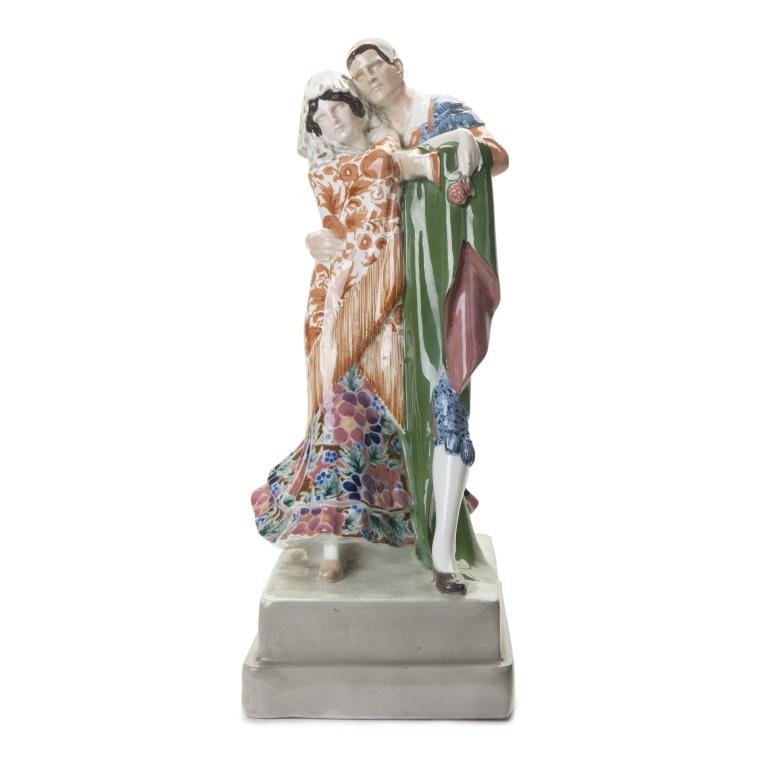 GOLDSCHEIDER VIENNA DANCING SPANISH COUPLE BY KARL: Provenance:Property from The Saul Brandman Foundation, Beverly Hills, California.Goldscheider Vienna Dancing Spanish Couple Clad in Spanish Garments. Model created by Karl Perl (1876 - 1965) / designe