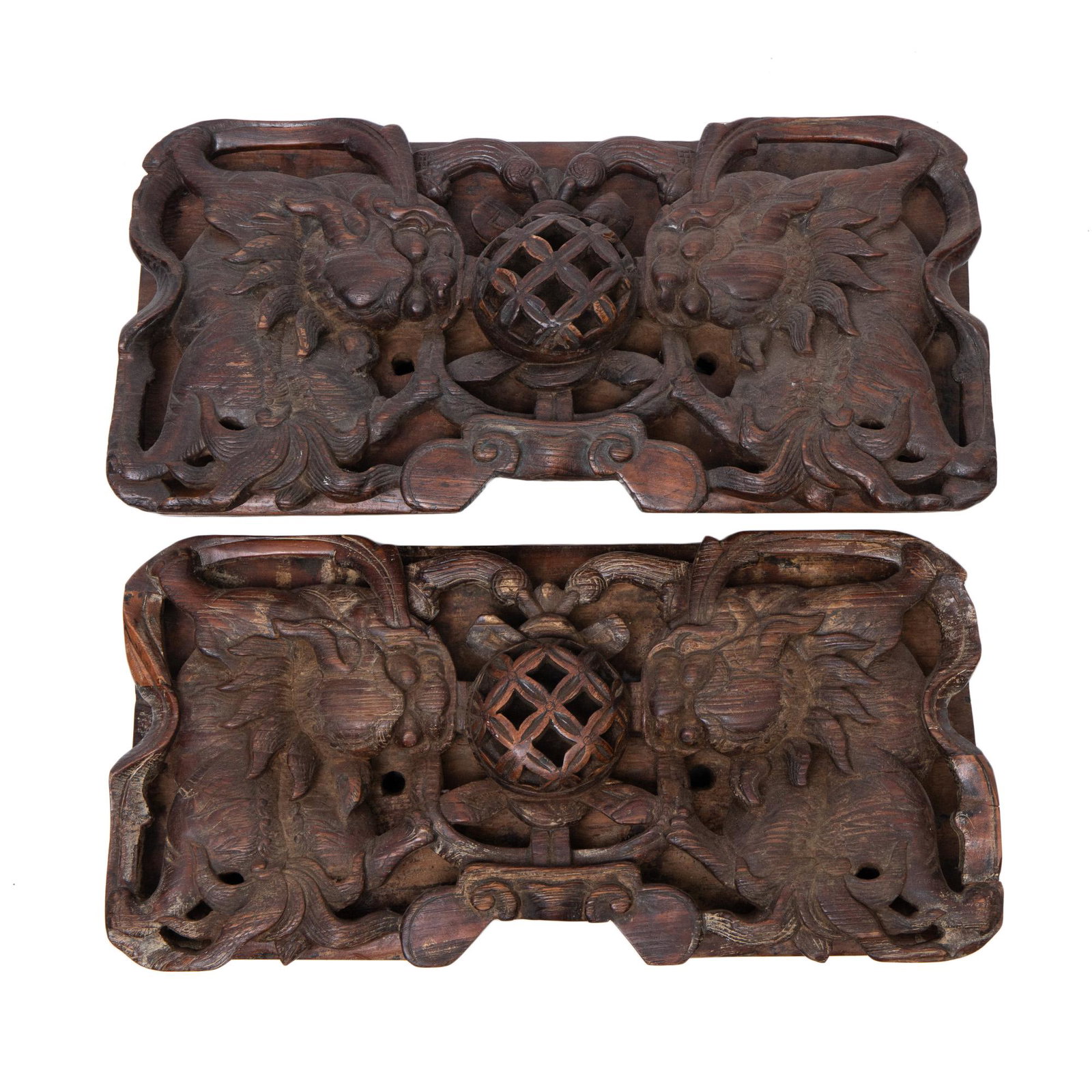 Pair Carved Wood Open Work Wall Decoration: L: 23 in. (58.42 cm ) H: 11 in. ( 27.94 cm ) D: 3 1/2 in. ( 8.89 cm )