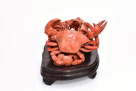 Orange red coral crab carving