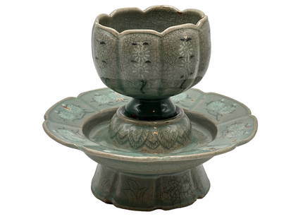 A Korean Celadon Cup and Saucer Chrysanthemum: A Korean Celadon Cup and Saucer with Inlaid Chrysanthemum H : 2 1/8 inches ( 5.39 cm) W: 6 inches (15.24 cm)