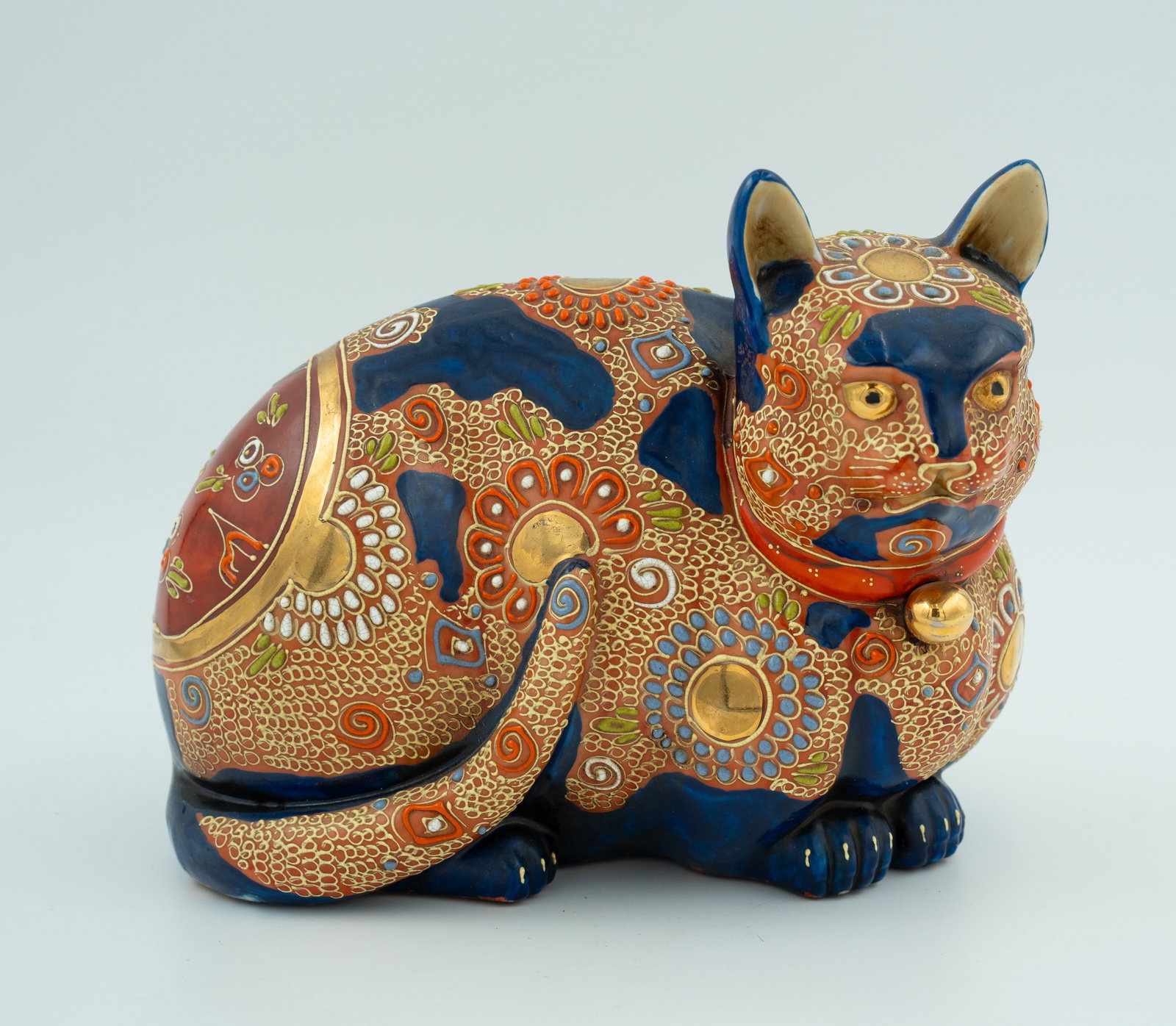 Japanese Satsuma-Style Gilt Porcelain Cat: Japanese Satsuma-Style Gilt and Polychrome Porcelain Cat Figure H: 7 1/2 inches W: 9 1/4 inches D: 4 3/4 inches