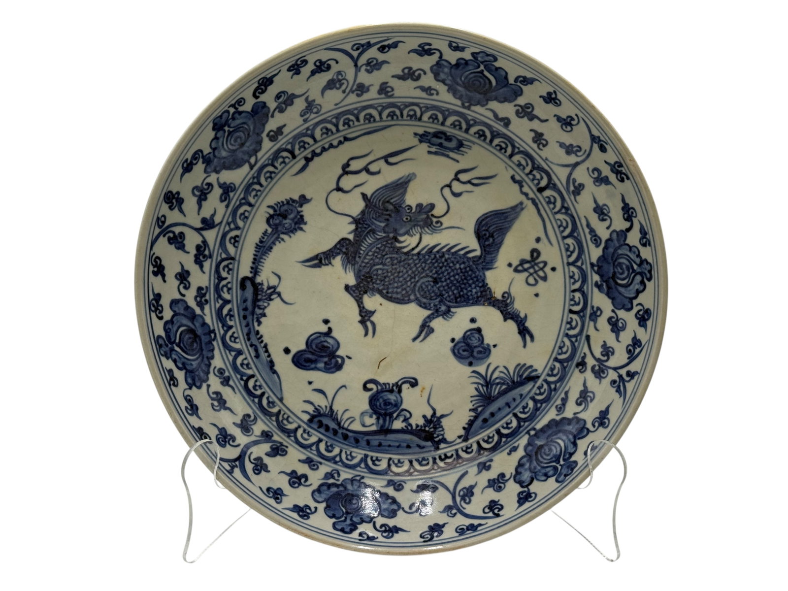 A Ming Dynasty Style Blue and White Dish: H: 2 1/2 inches W: 11 inches