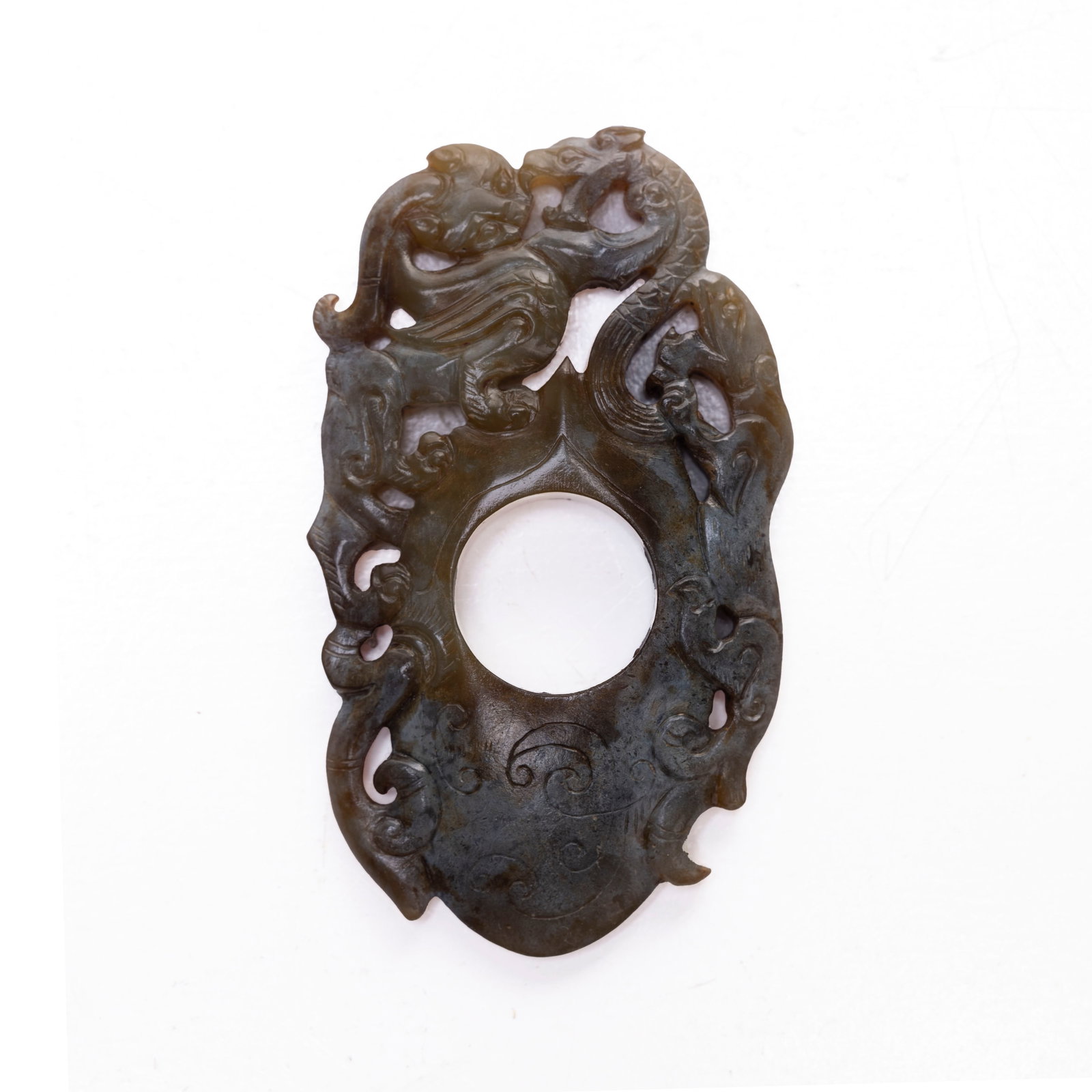 A Carved Russet Jade: H : 2 1/4 in ( 5.72 cm ) W ; 1 1/2 in ( 3.81 cm )