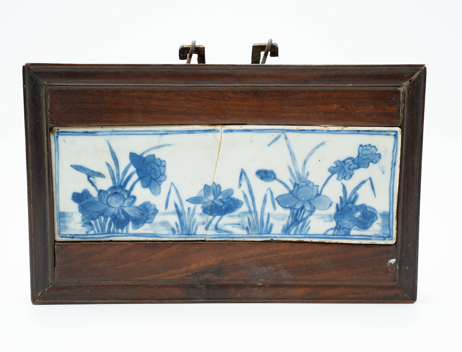 A Blue and White Plaque with Wood Framed: W: 9 1/4 inches H: 5 3/4 inches