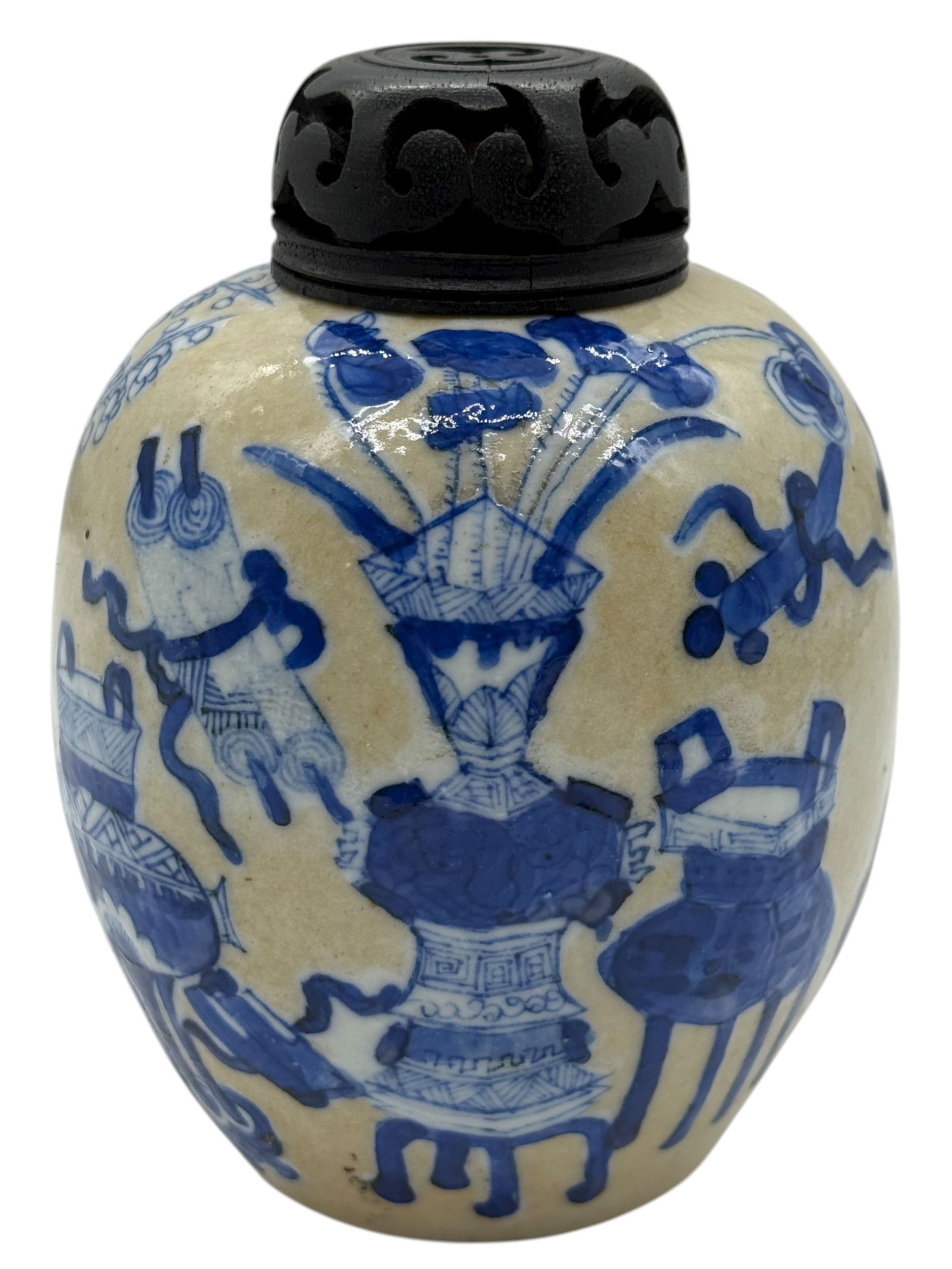 A Blue and White Ovoid Jar with Wood Cover: A Blue and White ‘Hundred Antiques’ Ovoid Jar, with Carved Wood Cover H: 5 1/4 inches W: 4 inches