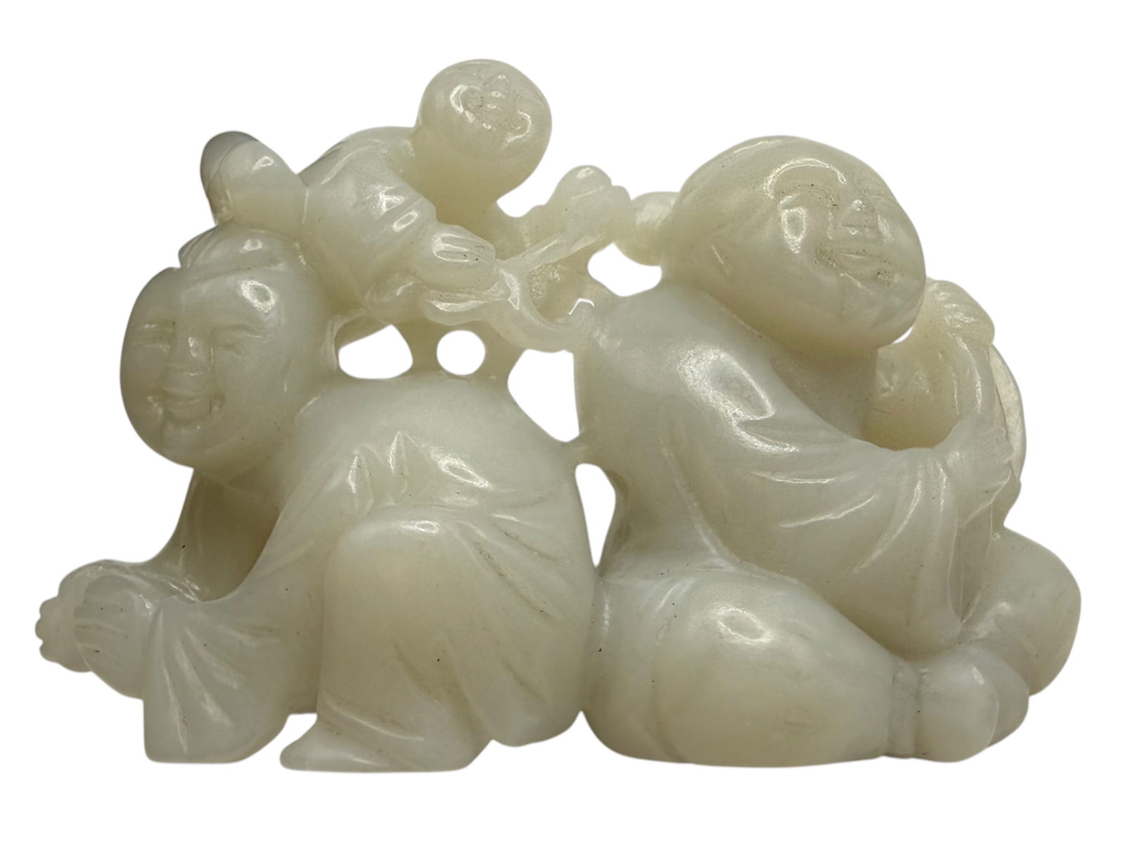A Chinese White Jade Group of Three Boys (1 of 3)