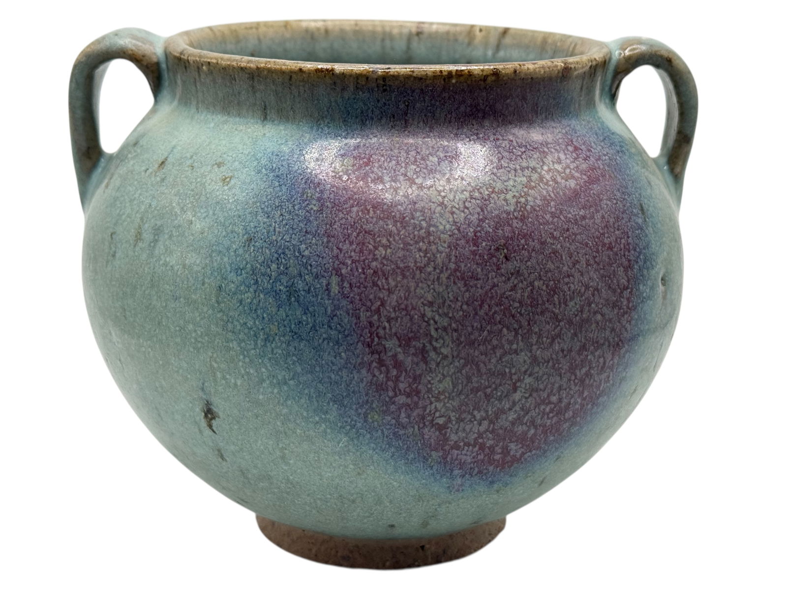 A Chinese Jun-Style Glazed Twin-Handled Jar: Of globular form with two small loop handles, showing lavender and blue glaze transitions. H: 5 inches W: 6 inches