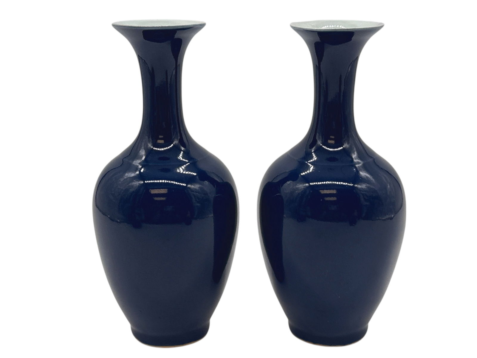 A Pair of Chinese Monochrome Blue-Glazed Vases: H: 8 1/2 inches D: 4 inches