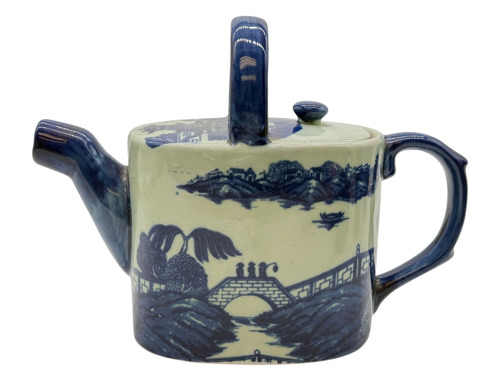 An Export Chinese Blue and White Teapot: H: 8 inches W: 10 1/2 inches D: 4 1/4 inches