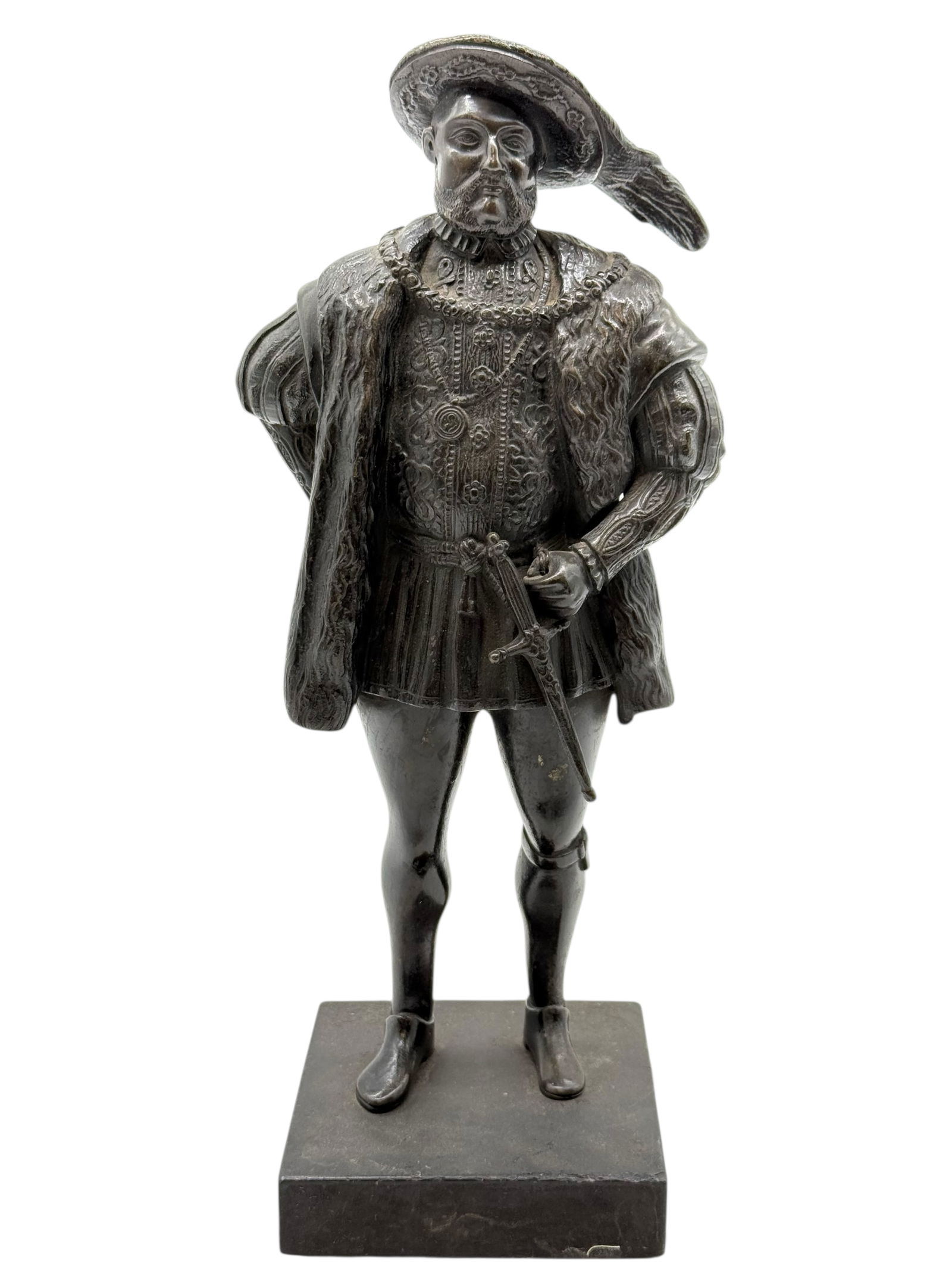 A bronze sculpture depicting Henry VIII: H: 13 3/4 inches W: 4 1/2 inches D: 4 1/2 inches