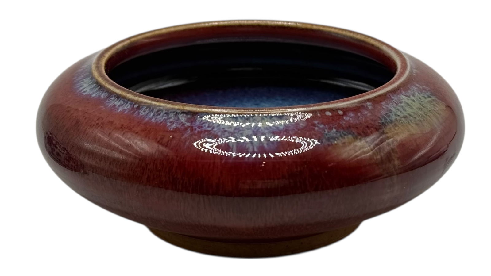 A Chinese Flambe-Glazed Washer: H: 1 1/2 inches W: 4 1/2 inches