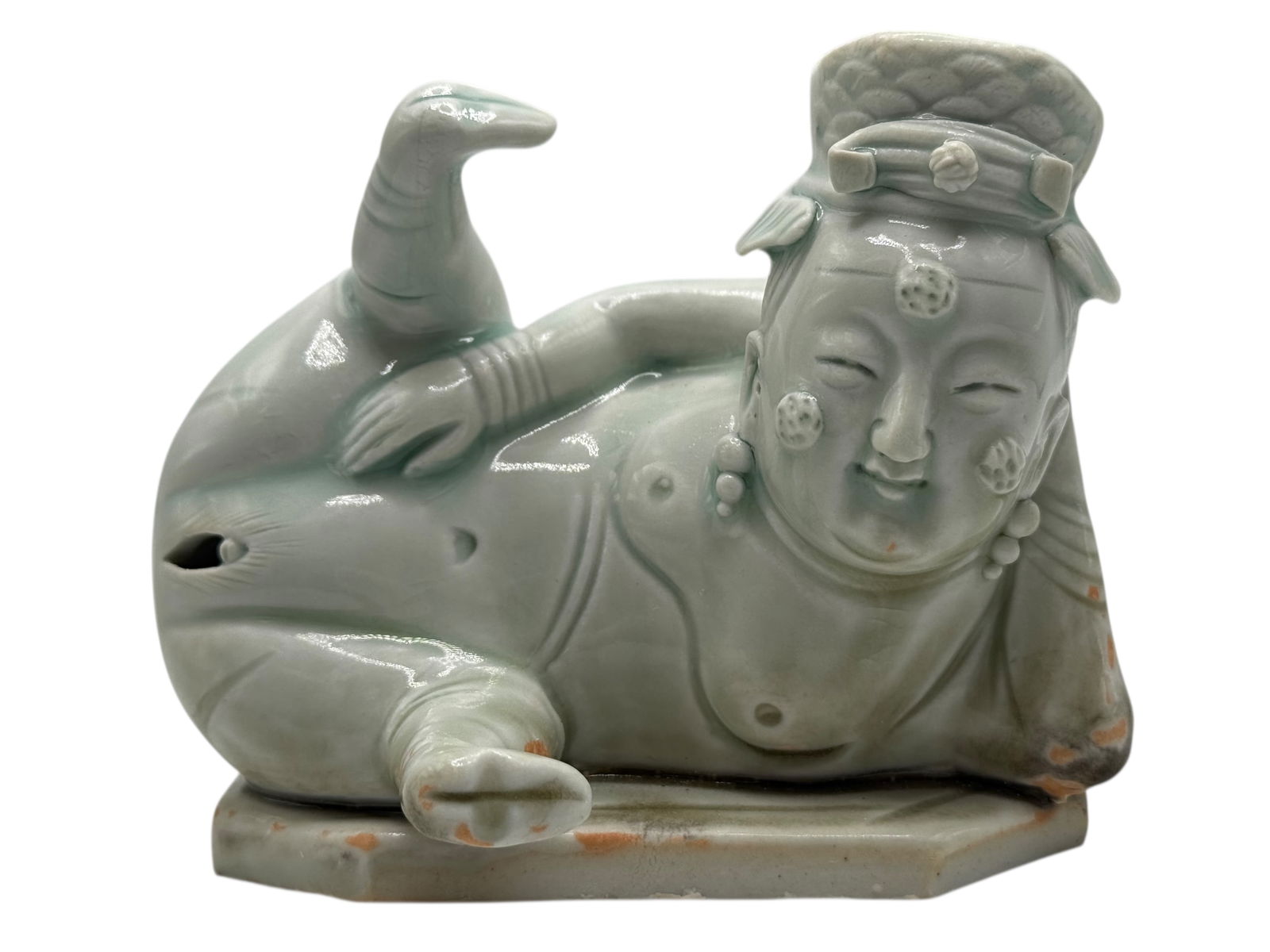 Chinese Celadon-Glazed Reclining Figure,Song Style: H: 3 3/4 inches W: 4 3/4 inches