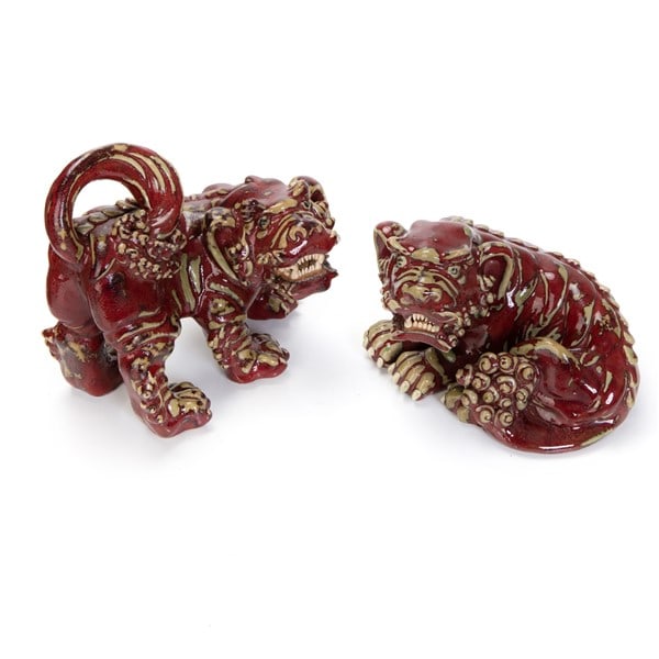 PAIR OF RED GLAZED RED YIXING GLAZED FOO LIONS: H:7in(17.7cm) X 7in(17.7cm)