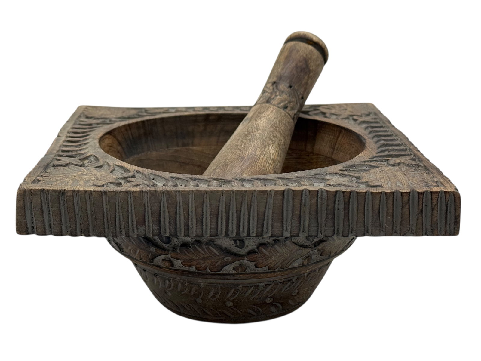 A Carved Wooden Mortar and Pestle: H: 4 inches W: 8 1/2 inches