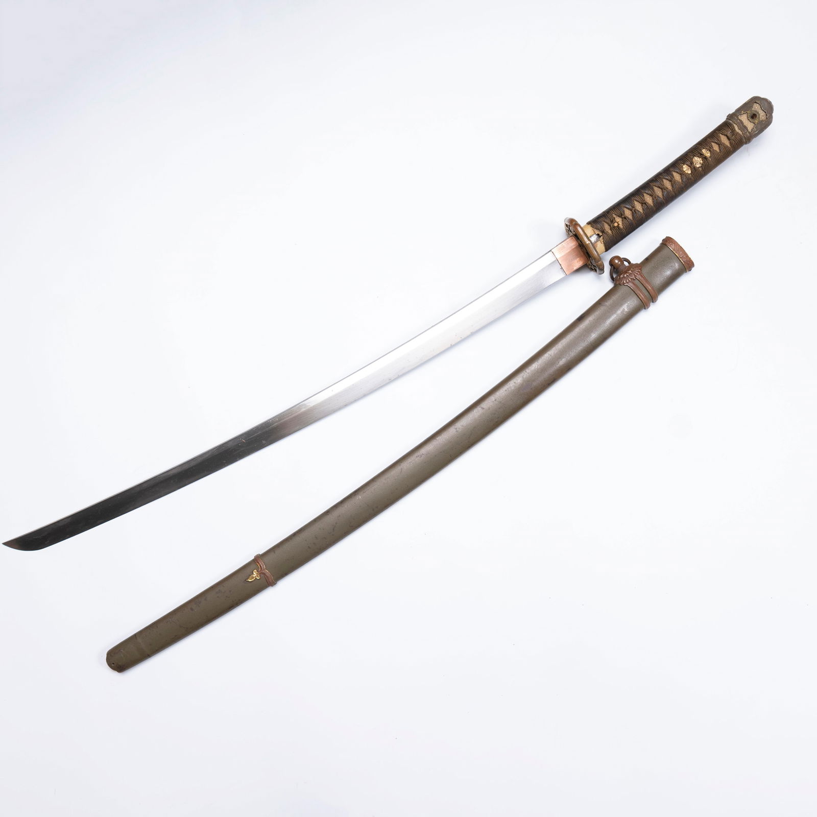 A Japanese Shin-Gunto Officer’s Sword with Lacquer: A Japanese Shin-Gunto Officer’s Sword with LacquerL: 39 inches W: 2 3/4 inches