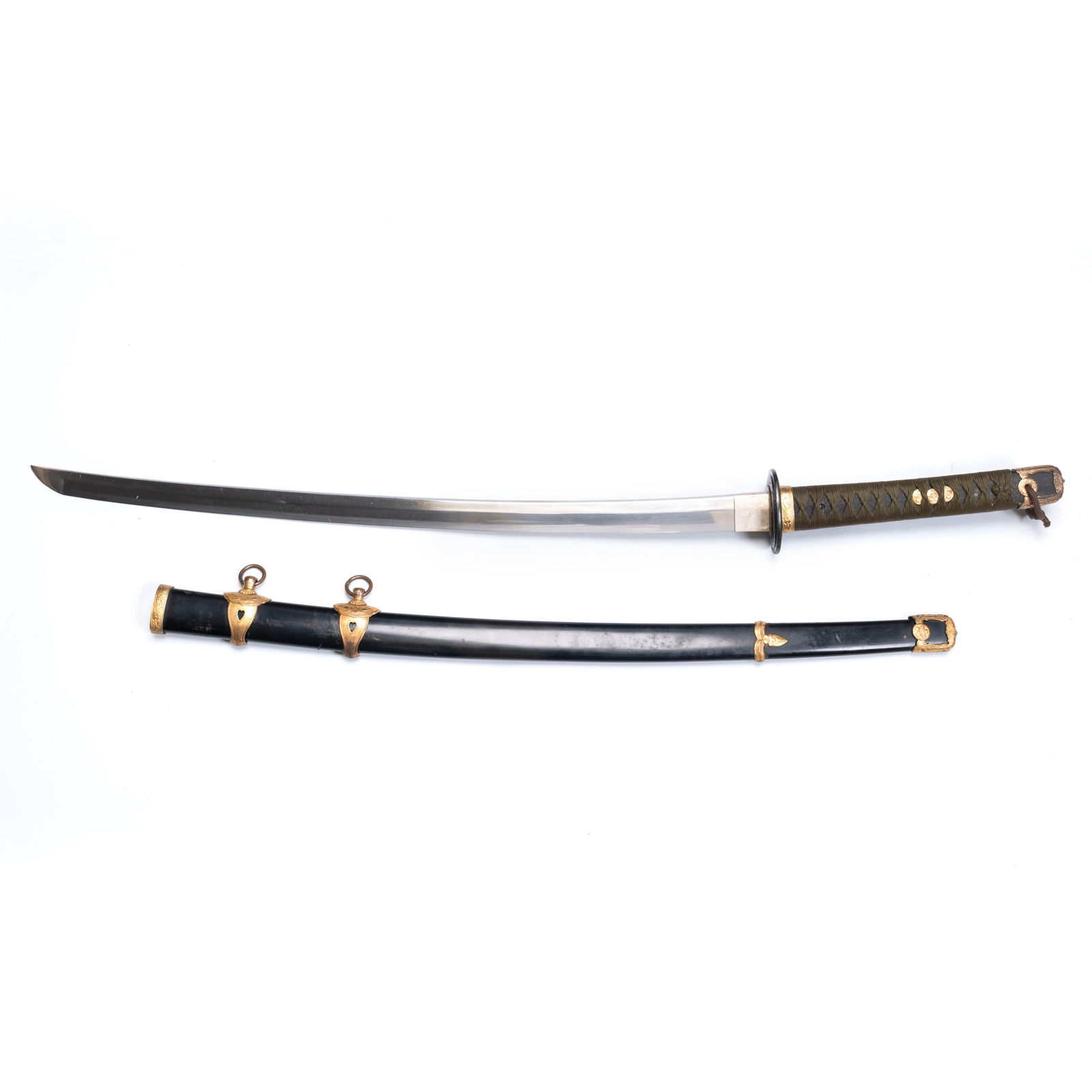 Japanese WWII Naval Officer’s Kaigunto Sword with: Japanese WWII Naval Officer’s Kaigunto Sword withJapanese WWII Naval Officer’s Kaigunto Sword with Anchor Stamp, ca.1940 This is a Japanese WWII Naval officer`s sword in kaigunto mountings. The bl