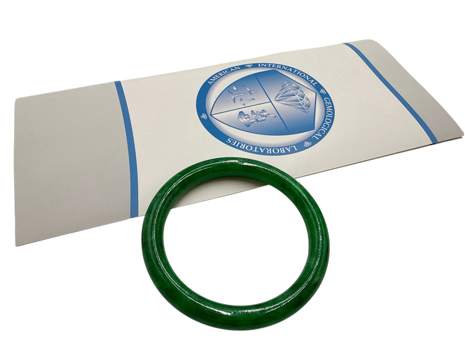 AIGL Certified Natural Jadeite Bangle: AIGL Certified Natural Jadeite BangleOutside Diameter: 78.7 mm Inside Diameter: 60.7 mm Weight : 45.5 grams